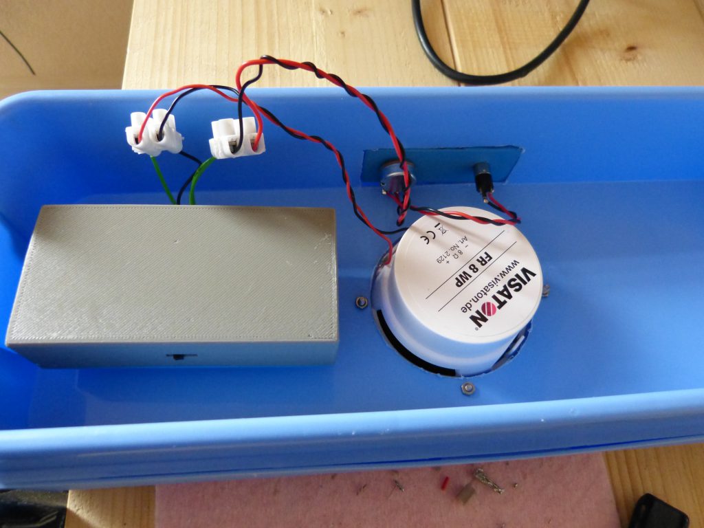 The complete audio system in the lid of the cooler. Most components are placed in the 3d printed enclosure.